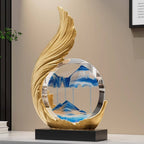Resin Phoenix Figurine – Golden Feather design with blue mountain sand art in a living room