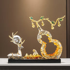 Lucky Deer & Gourd Resin Ornament – deer resting beside a golden gourd sculpture in a warm interior