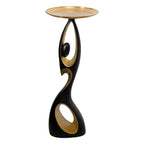 Black and gold Dancing Life floor ornament on a white background
