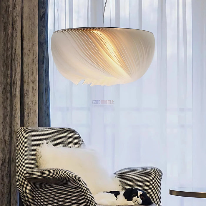 Nordic parchment pendant light with warm glow in a minimalist interior