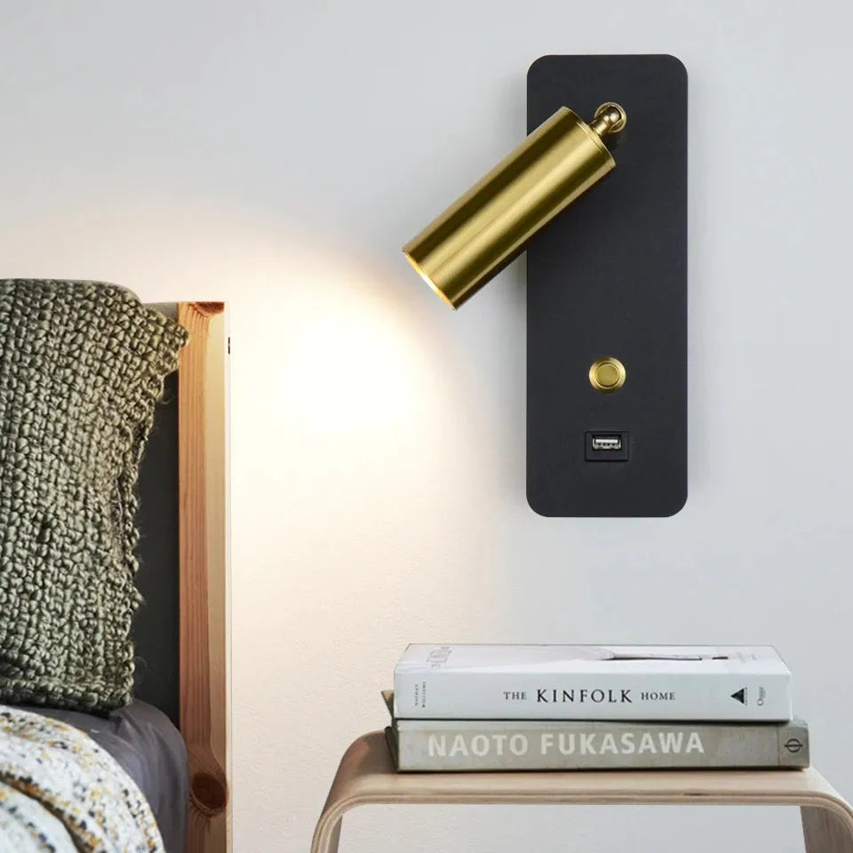 Modern LED wall lamp mounted beside a bed