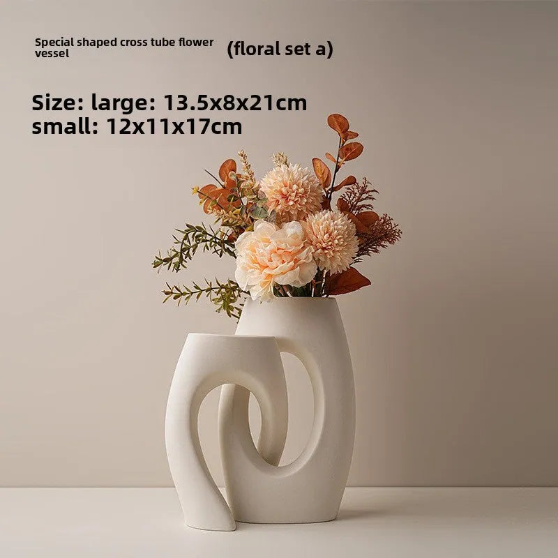 Decorative ceramic vase in white finish