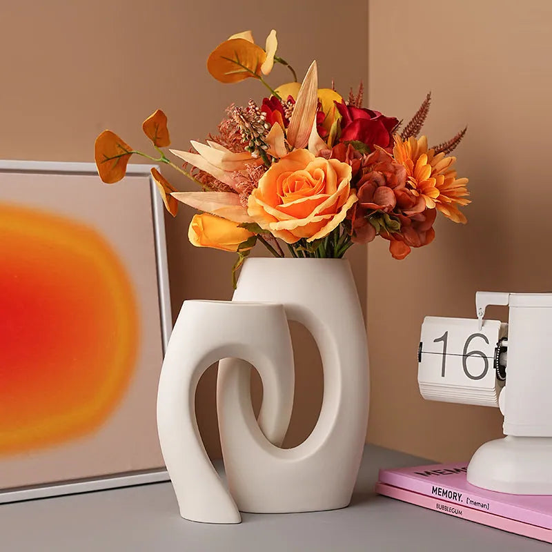 White porcelain vase with sculptural cross-tube shape