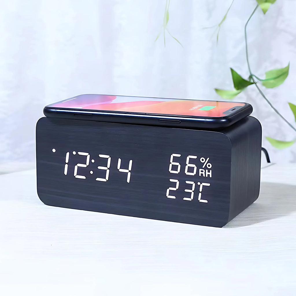 Wireless charging clock in natural wood style on a bedside table
